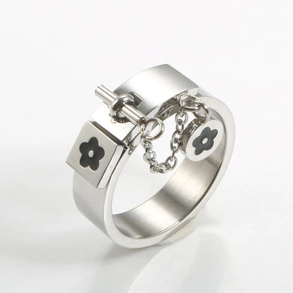 LuxéGlow™ Golden Stainless Steel Jewelry Set – Unisex Bangle Bracelet & Flower Charm Ring