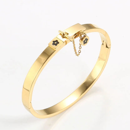 LuxéGlow™ Golden Stainless Steel Jewelry Set – Unisex Bangle Bracelet & Flower Charm Ring