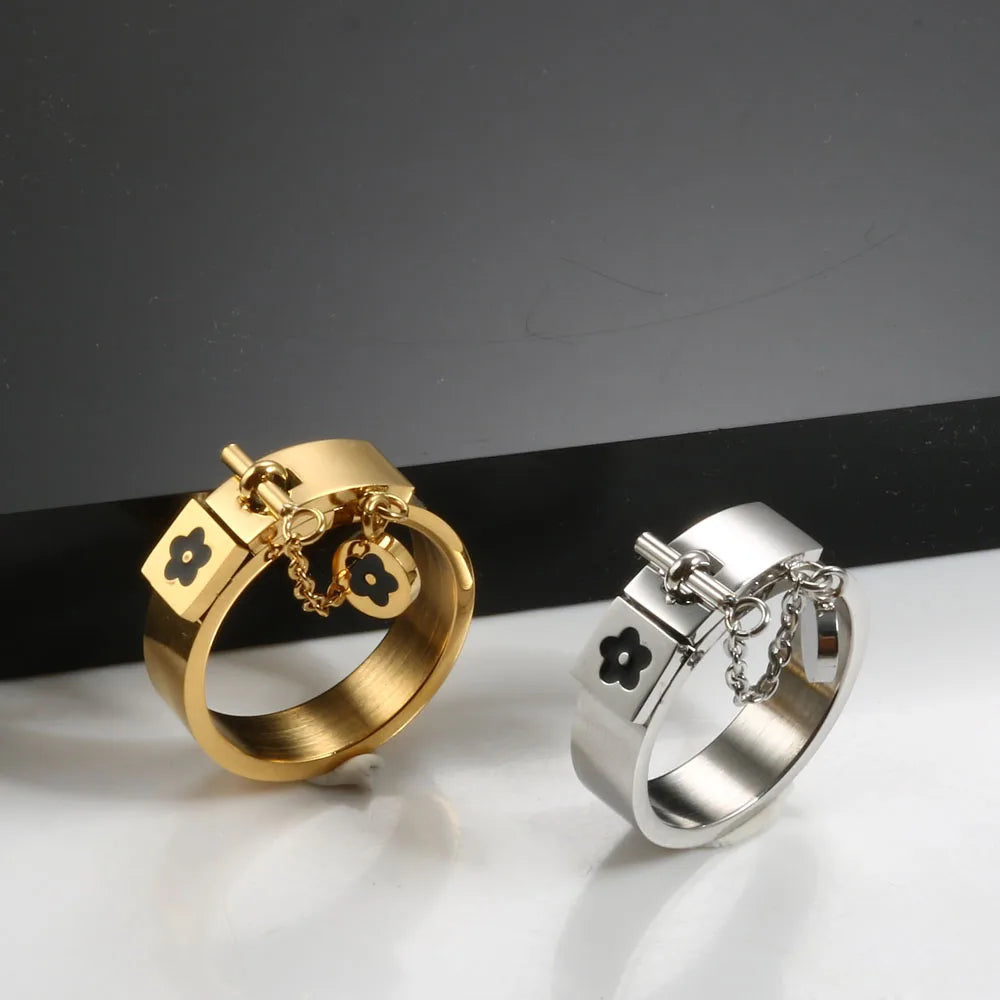 LuxéGlow™ Golden Stainless Steel Jewelry Set – Unisex Bangle Bracelet & Flower Charm Ring