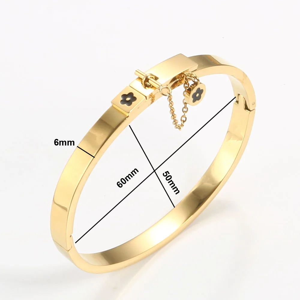LuxéGlow™ Golden Stainless Steel Jewelry Set – Unisex Bangle Bracelet & Flower Charm Ring