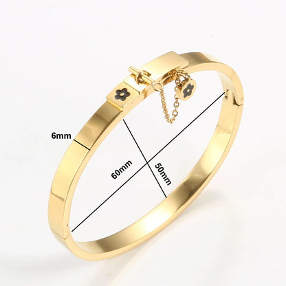 LuxéGlow™ Golden Stainless Steel Jewelry Set – Unisex Bangle Bracelet & Flower Charm Ring
